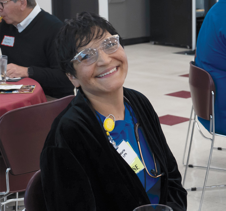 Maria Fonseca Bigham wore here nurses uniform to the event to thank the KCC Foundation for helping her obtain her LPN. (KCC photo)